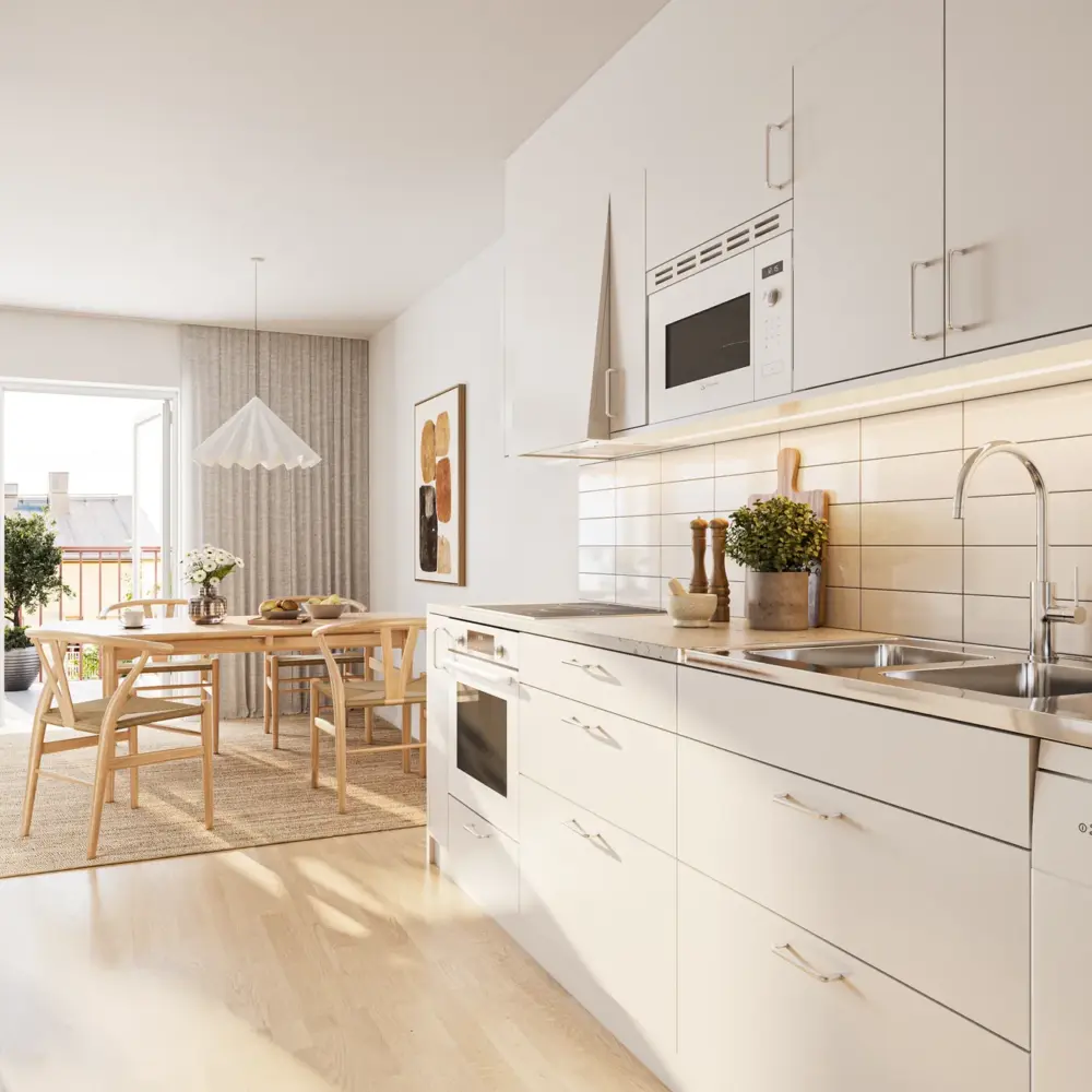 Visualisering av ett ljust kök med vita skåp och matplats vid fönstret i Sigtuna Stadsängar